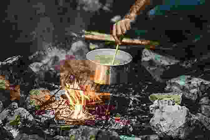 A Chef Cooking Over A Campfire In A Wilderness Setting In The Wild Chef: Recipes From Base Camp To Summit